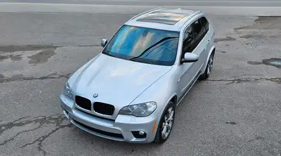 2013 BMW X5 XDRIVE 35I with M Power body kit, 6cyl and 3.0L engine. Power door locks, power window,...
