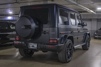 This Mercedes-Benz G-Class has a powerful Twin Turbo Premium Unleaded V-8 4.0 L/243 engine powering... (image 8)