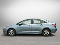 This Toyota Corolla boasts a Gas/Electric I-4 1.8 L/110 engine powering this Variable transmission.... (image 7)