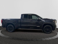 This 2025 GMC Sierra 1500 in Titanium Rush Metallic is equipped with 4WD and Turbocharged Diesel I6... (image 5)