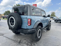 This 2023 Ford Bronco Outer Banks is a head-turner, boasting a Velocity Blue Metallic exterior and a... (image 4)