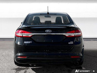 Experience effortless driving with this 2017 Ford Fusion SE. Boasting a fuel-efficient 1.5L EcoBoost... (image 2)