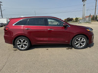 This 2019 Kia Sorento is finished in striking Passion Red Metallic with a refined Black interior, of... (image 8)