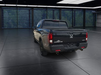 A rugged yet refined crew cab pickup with all-wheel drive and a 5.25 ft. box. The Black Edition incl... (image 6)