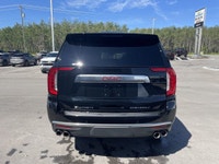 The 2023 GMC Yukon XL Denali is a full-size SUV that redefines luxury and capability, offering an ex... (image 7)