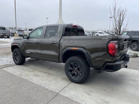 The 2024 GMC Canyon Elevation in Deep Bronze Metallic is a rugged and capable mid-size truck. Its bo... (image 4)