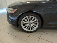 Audi's 2013 A6 3.0 Premium quattro Sedan looks sharp in Brilliant Black. Powered by a SuperCharged 3... (image 9)