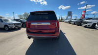 This GMC Yukon is equipped with: Perforated Leather Seating Surfaces, Remote Start, Heated Driver &... (image 9)