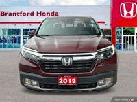 This 2019 Honda Ridgeline Touring Crew Cab Pickup boasts a powerful engine and a luxurious interior,... (image 8)