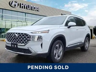 Experience the 2023 Hyundai Santa Fe Preferred SUV, boasting a stunning Quartz White exterior and bl...
