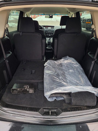 This stylish 2016 Mazda MAZDA5 Touring is a reliable and spacious wagon that's perfect for your dail... (image 4)