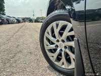 This 2019 Toyota Corolla LE boasts a sleek Black Sand Pearl exterior and a comfortable black interio... (image 9)