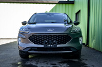 This 2021 Ford Escape is for sale today. This SUV has 104,943 kms. It's grey in colour . It has an a... (image 3)