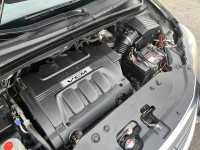 KBB.com 10 Best Used Family Cars Under $15,000. This Honda Odyssey boasts a Gas V6 3.5L/212 engine p... (image 8)