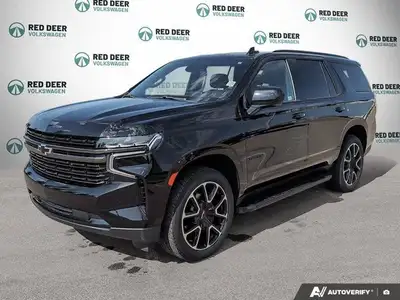 The 2021 Chevrolet Tahoe RST in black with a confident 4 4 drivetrain combines robust power and resp...