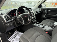 This 2014 GMC Acadia SLE-2 is a spacious and reliable SUV with a sleek white exterior and a comforta... (image 8)