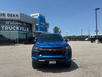 The 2023 Chevrolet Colorado 4WD LT Crew Cab in a striking blue finish offers impeccable handling wit... (image 5)