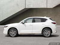 This Mazda CX-5 Signature comes equipped with Leather, Navigation, Apple CarPlay & Android Auto, Bra... (image 1)