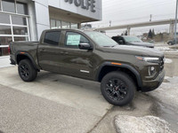 The 2024 GMC Canyon Elevation in Deep Bronze Metallic is a rugged and capable mid-size truck. Its bo... (image 8)