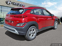 This 2022 Hyundai Kona Preferred SUV boasts a vibrant Pulse Red exterior and a sleek black interior.... (image 4)
