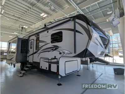 With triple slides, a rear entertainment center with fireplace, and a front bedroom, you will find t...