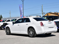 Slide into the sleek and sophisticated 2013 Chrysler 300S 3.6L, a sedan thats all about blending lux... (image 4)