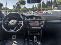 This Volkswagen Tiguan delivers a Intercooled Turbo Regular Unleaded I-4 2.0 L/121 engine powering t... (image 9)