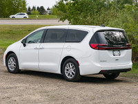 The *2023 Chrysler Pacifica Touring L* is a front-wheel-drive minivan designed for family comfort an... (image 5)