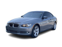 This gorgeous Space Grey over Black Dakota leather 2009 BMW 335i xDrive Coupe was traded in to us fr... (image 1)