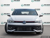 The 2025 Volkswagen Golf GTI in a striking white finish is a front-wheel-drive dynamo engineered to... (image 1)