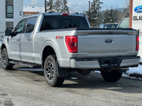 This 2023 Ford F-150 XLT has an Iconic Sliver Metallic exterior and Black Sport cloth seats with sea... (image 3)