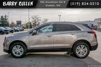 The 2023 Cadillac XT5 FWD Luxury in an elegant tan hue with its nimble front-wheel drive is all abou... (image 7)