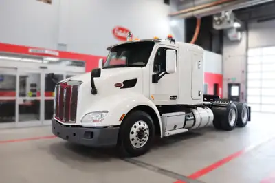 Engine: Paccar MX 13 HP: 455 Trans: 12 Speed Automatic Ratio: 3.36 Wheelbase: 214" Suspension: Low A...