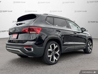 Command attention with the 2022 Volkswagen Taos Highline SUV. This sleek black beauty boasts a panor... (image 6)