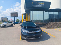 Summary The Touring represents the pinnacle of the 2019 CR-V lineup, offering a refined blend of per... (image 1)
