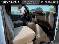Introducing the 2025 Chevrolet Express Cargo Van in a crisp white hue with Rear-Wheel Drive that pro... (image 5)