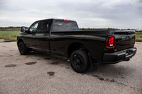 This Ram 2500 has a powerful Regular Unleaded V-8 6.4 L/392 engine powering this Automatic transmiss... (image 1)