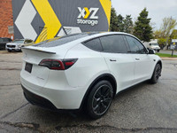 This stunning TESLA MODEL Y WITH UPGRADED LUXURIOUS Pearl White Exterior paint option with the stunn... (image 6)