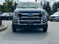 This 2021 Ford F-550 XLT has an Oxford White exterior and Earth Grey cloth seats with seating for 5.... (image 9)