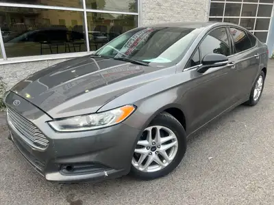2013 FORD FUSION .AUTOMATIQUE. INTERIEUR VITRES-PORTES- MIRROIRS- ELECTRIQUE. A/C.LECTEUR C/D .5 PAS...