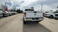 This Ram 2500 is equipped with: Cloth Front 40/20/40 Bench Seat, Radio: Uconnect 5 Nav w/8.4 Display... (image 6)