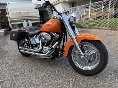 100TH ANNIVERSARY FATBOY. Factory flames paint job. Fuel injected. Just serviced and inspected. Bike...