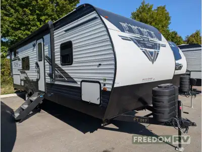 Palomino Puma travel trailer 23BHQ highlights: Bunk Beds RV Queen Bed Sofa Rear Corner Bathroom Outs...