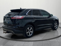 Up for sale is a well-maintained 2019 Ford Edge SEL, featuring a sleek black exterior and a rare tan... (image 5)