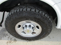 4.8 liter ,auto ,air , am/fm radio. work ready, cargo equipped with divider,ladder rack and loads of... (image 6)