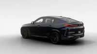 La conception audacieuse du *BMW X6 M60i 2025* est indéniable. Du toit de type coupé au profil cisel... (image 1)