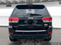 This Grand Cherokee features leather-trimmed, ventilated front seats, heated front and rear seats, p... (image 4)