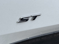 The 2025 Buick Envista Sport Touring in Summit White is a stylish and agile compact SUV, perfectly s... (image 6)