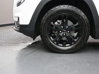 The 2023 GMC Terrain AT4 is a rugged compact SUV with a 1.5L turbocharged engine, all-wheel drive, a... (image 3)