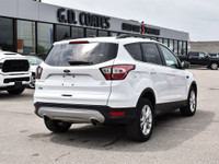 The 2018 Ford Escape SE is a compact SUV that, offers a mix of practicality and sportiness. The inte... (image 6)